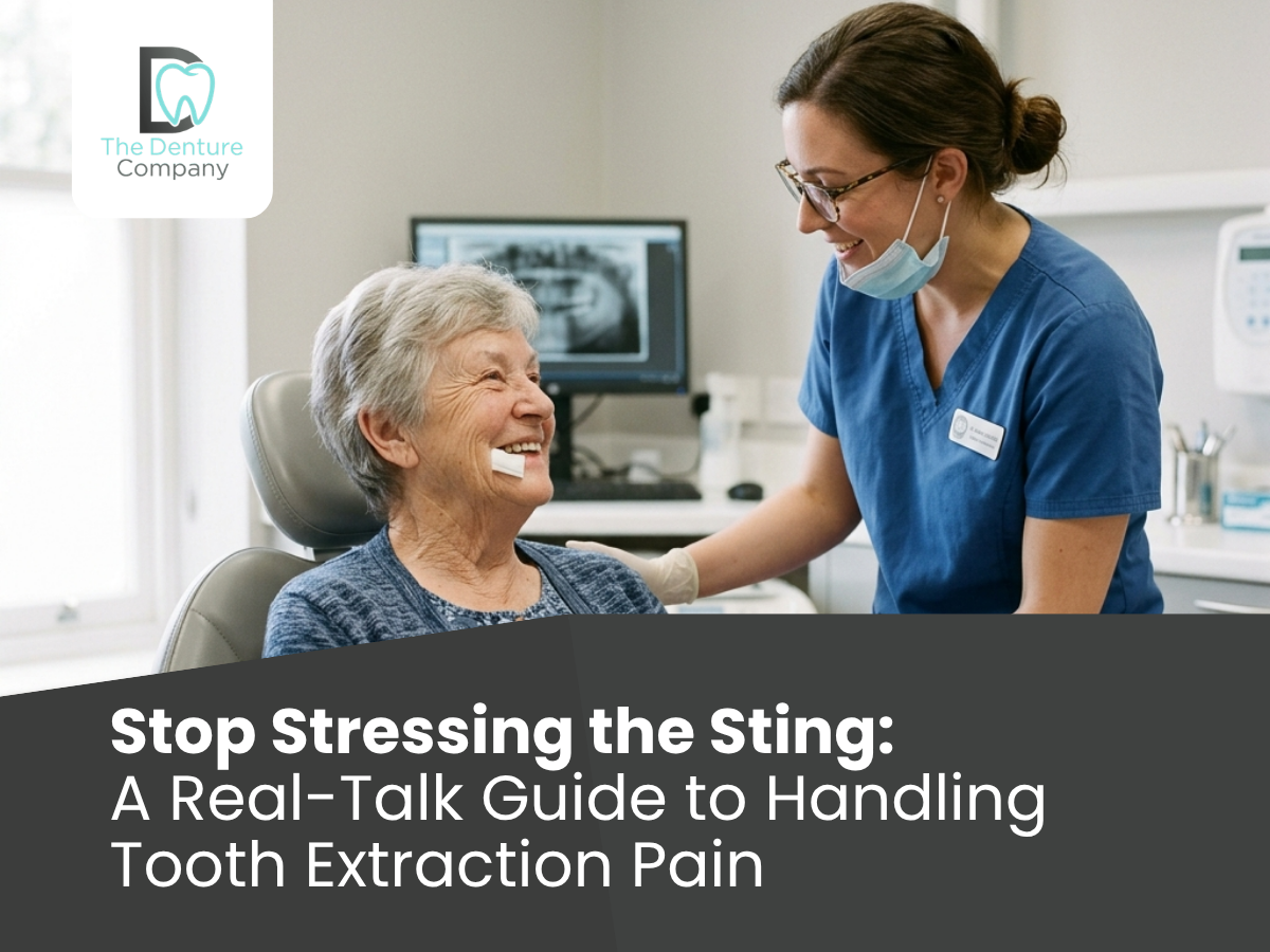 Dentist in blue scrubs smiles at an elderly patient in a dental chair during a teeth visit; overlaid headline reads 'Stop Stressing the Sting: A Real-Talk Guide to Handling Tooth Extraction Pain' with The Denture Company logo in corner.
